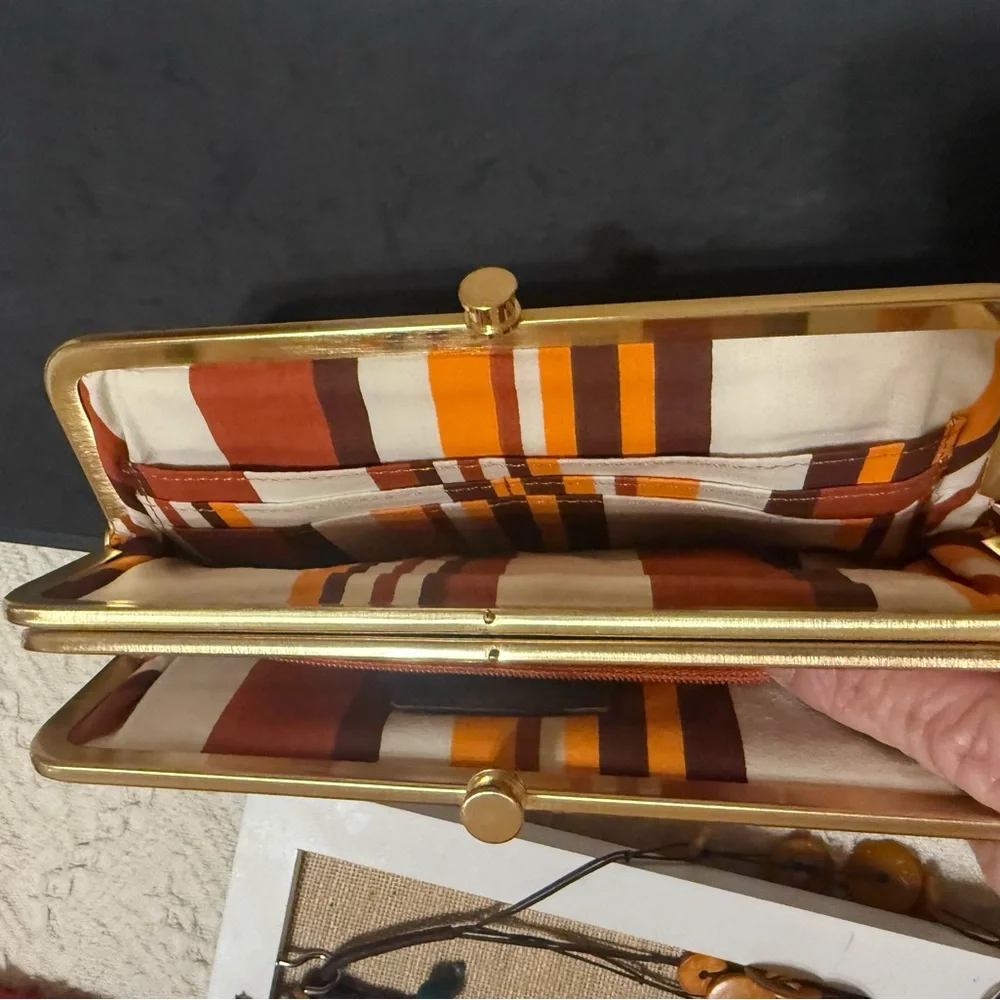 Tasche Burnt Orange Leather Clutch